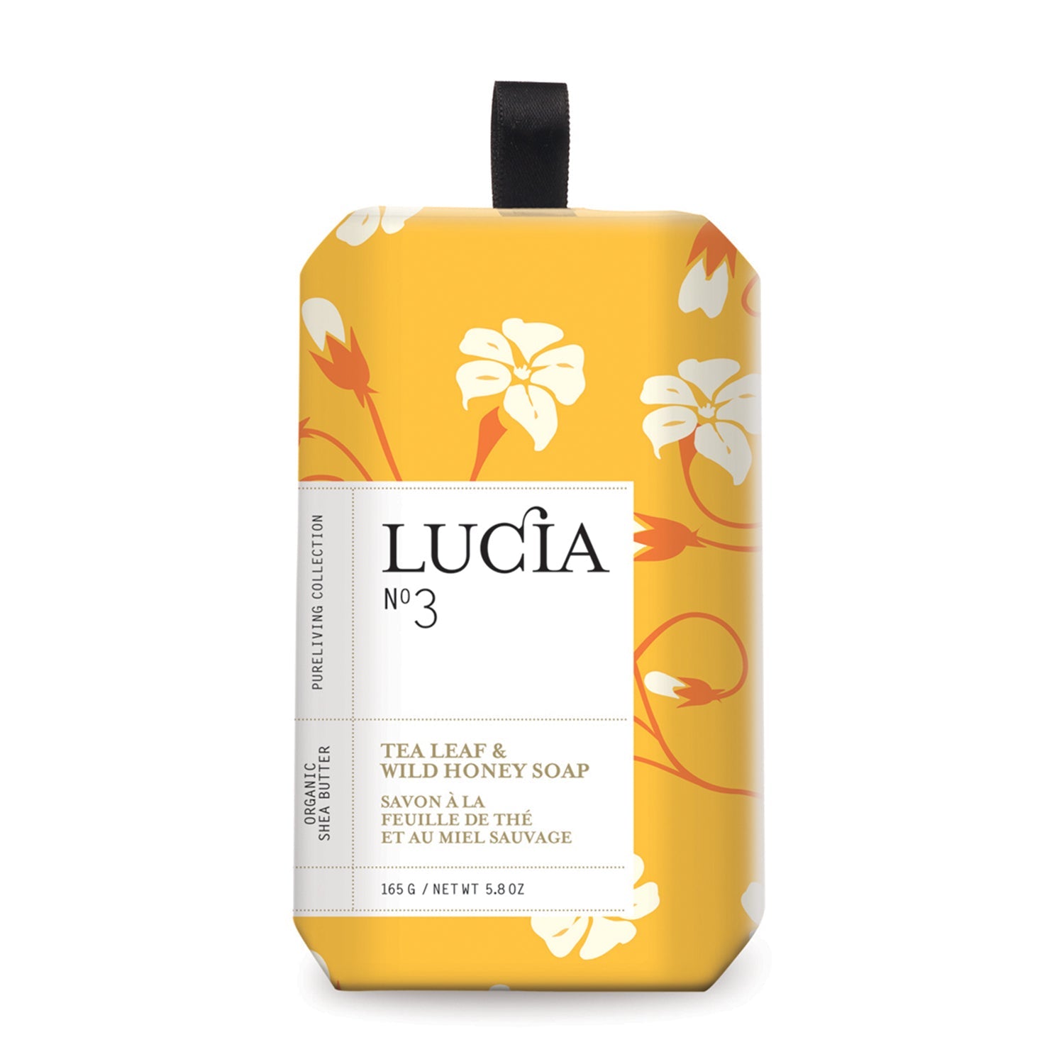 Bouteille de savon pour le corp en carton de couleur jaune orangé avec motif de fleurs.