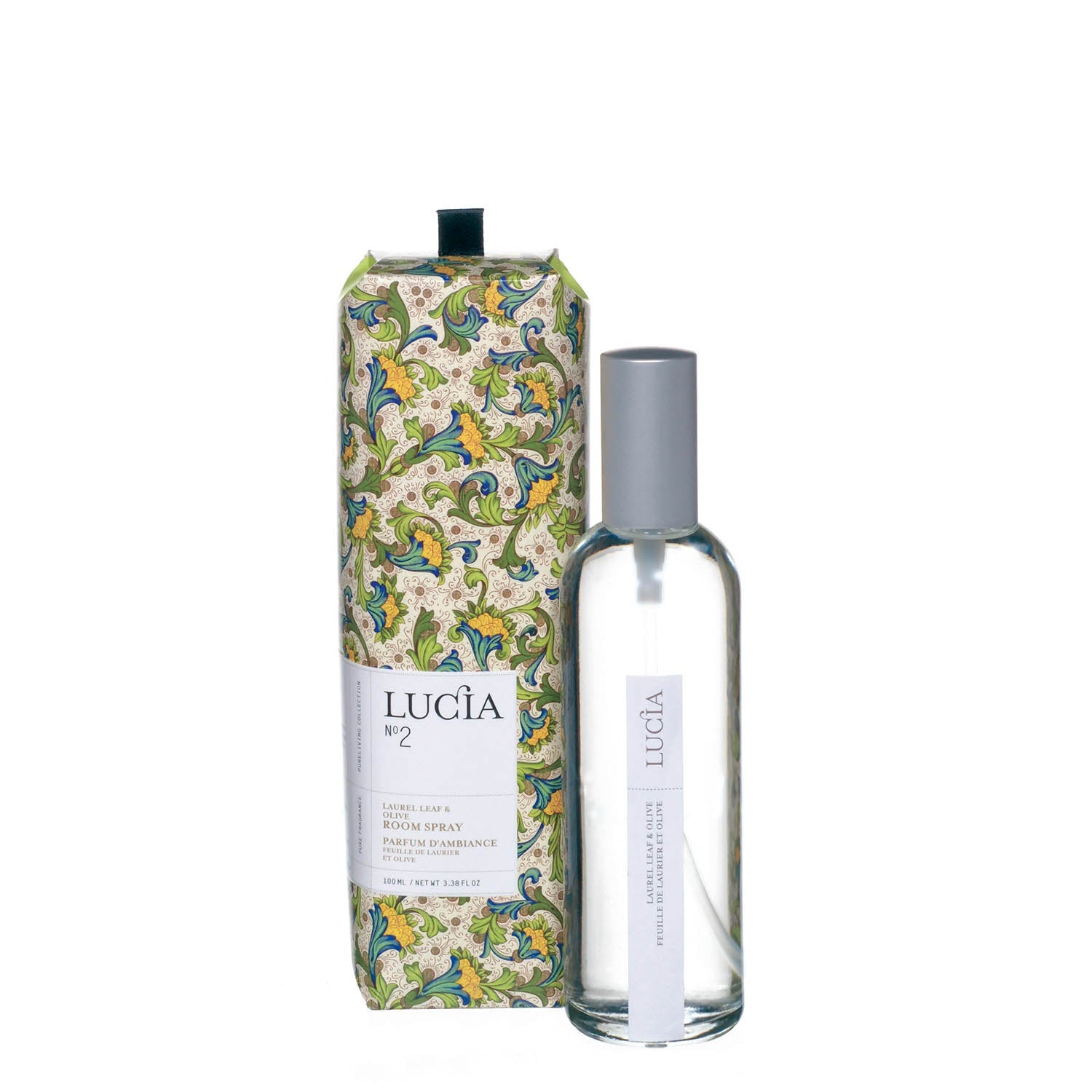 Bouteille vaporisateur de parfum d'ambiance en verre avec boîte aux motifs dans les teintes de vert.